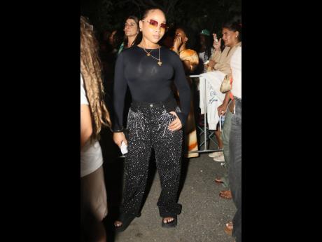 Above: Mystic Marley, photographed offstage in a bodysuit and bejewelled denim, was among the performers at the tribute concert for her brother, Joseph ‘Jo Mersa’ Marley.