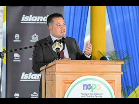 Minister of Water, Environment and Climate Change,  Matthew Samuda, delivering the keynote address during a recent National Schools Environmental Clubs Student Workshop, hosted by the National Environment and Planning Agency (NEPA) at Titchfield High Schoo