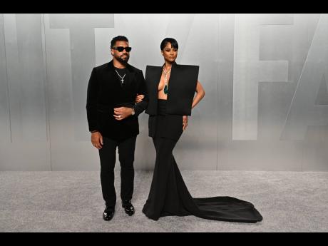 Credit: AP Power couple Ciara and Russell Wilson make it a date night at the Vanity Fair Oscars afterparty.