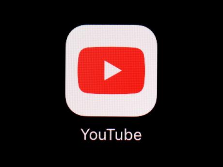 The YouTube app is displayed on an iPad in Baltimore on March 20, 2018. (AP Photo/Patrick Semansky, File)