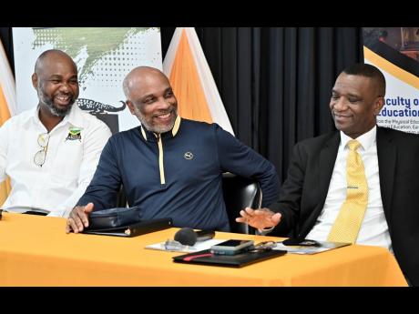 From left: Calbert Hutchinson, president of Jamaica Lacrosse; Christopher Samuda, president of JOA; and Dr. Asburn Pinnock, president of Mico University College, speak at the Jamaica Lacrosse press conference at the Mico University College in Kingston yest