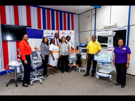 Representatives from Guardian Life Limited, along with the clinical and leadership team at Bustamante Hospital for Children, view the full set of newly delivered medical equipment on March 9 in the Conference Room at the Accident and Emergency Building. Th