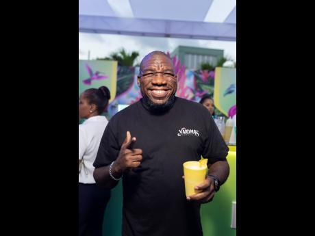 Credit: Contributed Michael ‘Fada Mike’ Gordon, director of Yard Mas Carnival, celebrates the synergy between the cognac brand and Jamaican carnival band.