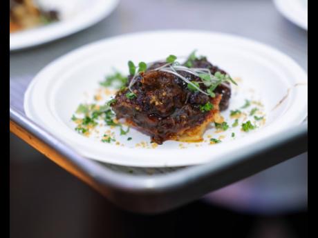 Chef Scotley Innis transforms tradition into culinary artistry with his oxtail pavé.