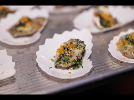 The ‘yard mon’ oyster blends callaloo and Scotch bonnet pepper. 