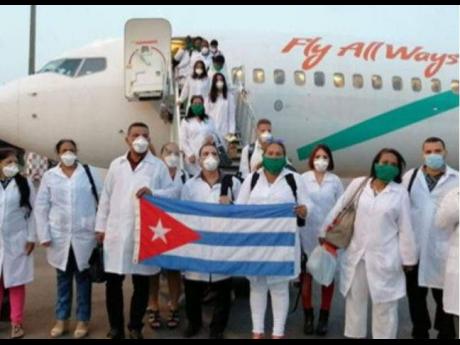 A team from the Cuban Medical Brigade arriving in the Caribbean 