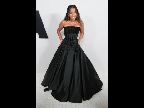 Jordyn Curet dons Sergio Hudson.