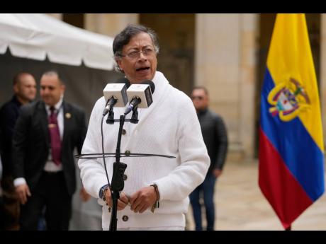 Colombia's President Gustavo Petro speaks after voting during legislative elections in Bogota, Colombia on March 8, 2026. (AP Photo/Fernando Vergara)