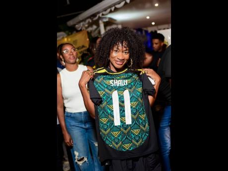 Credit: Contributed Carleene Samuels, talent manager, proudly showcases the jersey she copped.