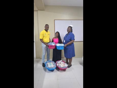 Credit: Photo by Mickalia Kington Chief Executive Officer Roan Grant (left), coordinator Vanessa Moore (centre), and Deputy Director of Nursing Services Petunia Leslie Blair during the handover of 200 receiving blankets to the maternity unit at Savanna-la-Mar Public General Hospital.