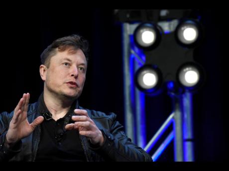 Tesla and SpaceX Chief Executive Officer Elon Musk speaks at the SATELLITE Conference and Exhibition in Washington, March 9, 2020.  (AP Photo/Susan Walsh, File)