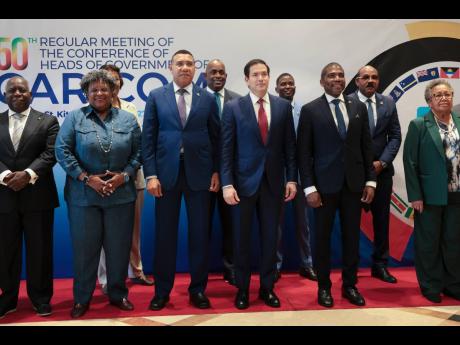 US Secretary of State Marco Rubio, centre front in red tie, poses for a group photo with other government officials attending CARICOM meeting in Basseterre, Saint Kitts and Nevis, in February. Pictured are, Bahamas’ Prime Minister Philip Edward Davis, le