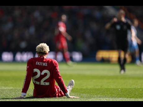 Credit: AP AP
Liverpool’s Hugo Ekitike sits injured during the English Premier League football match against Brighton in Brighton yesterday.