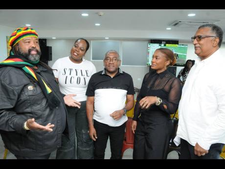 Solomon Sharpe (left), executive chairman of Supreme Ventures Racing and Entertainment Limited, addresses stakeholders and media personnel during the official press launch of the fifth running of the Mouttet Mile at Caymanas Park on Saturday.