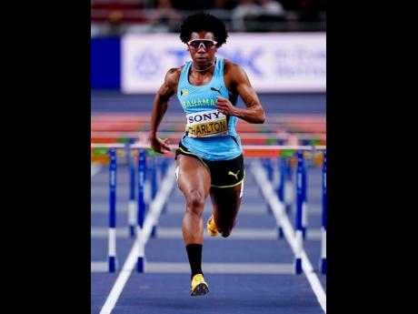 Devynne Charlton powers towards her third World Athletics Championships 60-metre hurdles title, clocking 7.65 seconds inside the Kujawsko-Pomorska Arena in Torun, Poland, on Sunday. 