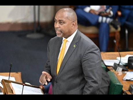 Opposition Spokesman on Finance Julian Robinson making his contribution to the 2026-2027 National Budget Debate in the House of Representatives on March 12, 2026. 