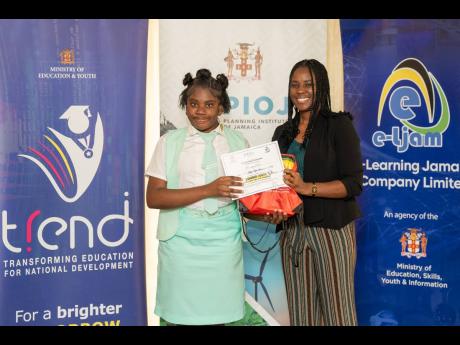 Dayanna Jackson of the Lister Mair Gilby School for the Deaf receives her certificate of participation and gift at the March 19 recognition ceremony in Kingston for students who participated in the Sustainable Development Goals (SDG) Youth Creative Express