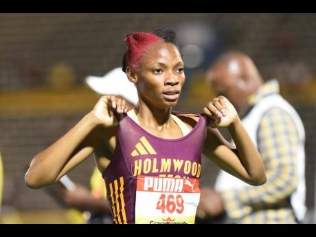 Jovi Rose of Holmwood Technical celebrates after winning the Class One girls 1500mat Champs 2026.