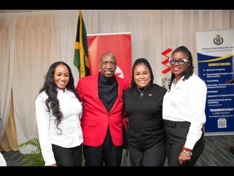 Deputy Chaplain, Rev Dr Courtney Faulknor (second left) is joined by (from left) Marsean Mullings-Thomas senior financial service specialist, Charmaine McConnell-Taylor, manager, sales and services and Michelle Wallace, assistant manager business services 