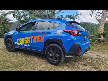 Credit: Kareem LaTouche From the rear, the high-mounted spoiler and integrated diffuser elements highlight the aerodynamic refinements made to the third-generation body while maintaining a stout, planted stance.