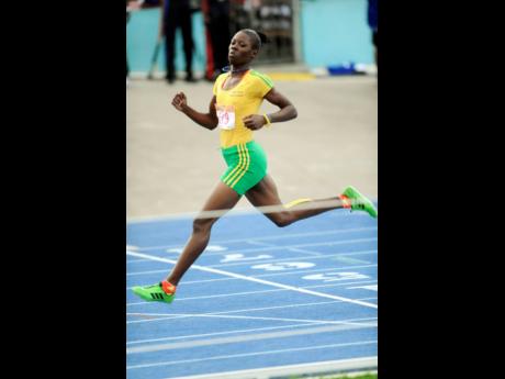 Ricardo Makyn/Staff Photographer                                                                                                                                         
Shericka Jackson of Vere winning the Girls Class 1, 200 Metres.                       