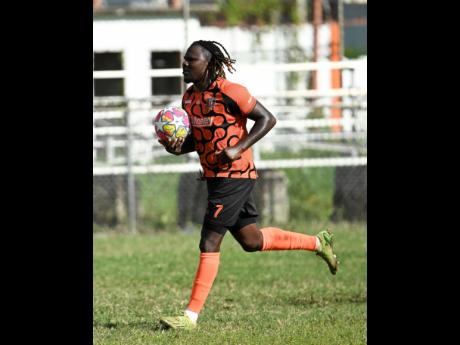 Tivoli’s Rodico Wellington runs to the centre circle after scoring the equaliser against Harbour View at the Edward Seaga Sports Complex yesterday. 