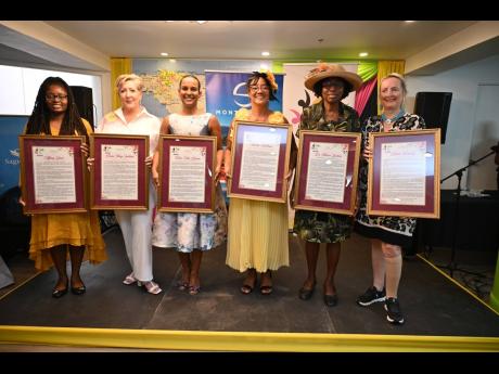 Women of Resilience Honorees 2026 (from left): Tiffany Grant, Pastor Mary Wildish, Tricia-Ann Bicarie, Tamika Williams, Dr Marcia Graham, and Katrin Casserly with their citations during the Women of Western Jamaica Brunch held last Sunday at the S Hotel Mo