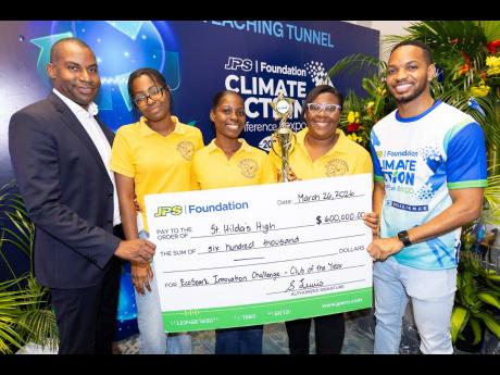 Hugh Grant (left), president & CEO of JPS, and Aundhrae Richardson (right), JPS Foundation officer, pose with representatives of St Hilda’s Diocesan High School, which was named the JPS Foundation Power Up Energy Club of the Year during the JPS Foundatio