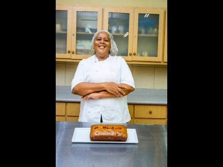 Chef Nichola McBeam paused for a photo with the finished Easter bun.