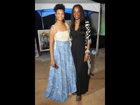 Fashion designer Ackeilia Caine (left) shared the camera lens with Melissa Preddie of Aviola Accessories, whose handcrafted pieces complemented the Island in Bloom collection.