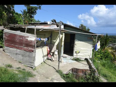 
Seventy-year-old shopkeeper Cislyn Tulloch’s home remains in disrepair, with a leaky roof and water damage, while she struggles to restore her small shop in Windsor, St Ann.