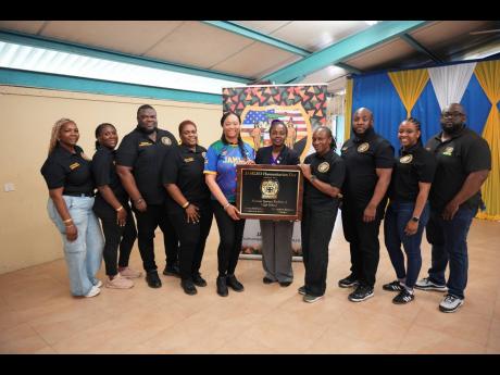 Representatives of JAMLEO at last year’s humanitarian mission at Marcus Garvey Technical High School in St Ann.