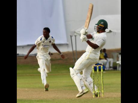 Jamaica Scorpions batsman Brad Barnes plays a hook shot against Barbados Pride pacer Johann Layne during their drawn West Indies Championship game at Sabina Park yesterday.
