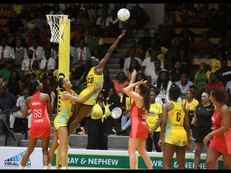 Credit: Antoine Lodge
Sunshine Girls goal defence Jodian Ward (third left) rises to challenge a shot by England Vitality Roses’ goal attack Lois Pearson (third right) during game three of the Horizon Netball Series at the National Indoor Sports Centre on November 25, 2024. R