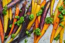 Roasted carrots topped with spinach-parsley pesto.